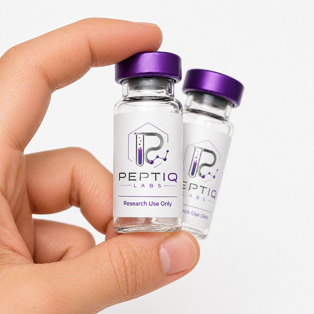 Peptiq Labs research vial held in hand